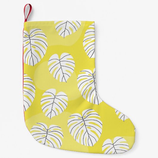 Monstera leaves, bright yellow background. kleine kerstsok (Voorkant)