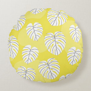 Monstera leaves, bright yellow background. rond kussen