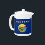 Montana Staatsvlag theepot<br><div class="desc">Verhoog je theetijd met een vleugje Montana-trots met onze exclusieve theepot met de vlag van Montana! Deze theepot is gemaakt met aandacht voor detail en is meer dan alleen een functioneel item; het is een viering van het erfgoed en de culturele trots van Montana. Het ontwerp toont prominent de iconische...</div>