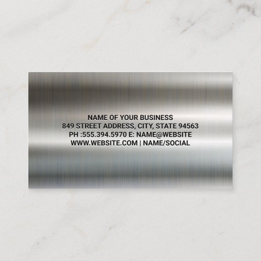 Monteur met behulp van moersleutel op de motor visitekaartje (Achterkant)