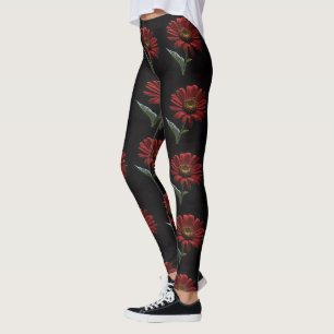 "Mooi en Moedig: Een Enkele Rode Margriet op Zwart Leggings
