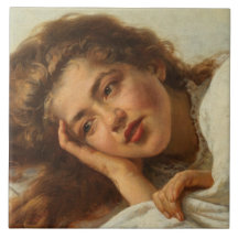 Mooi meisje dat in bed ligt met rood haar