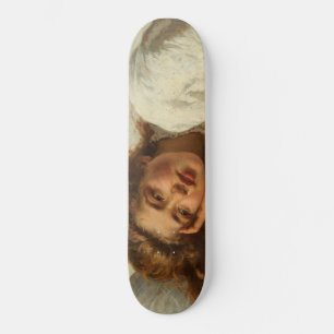 Mooi meisje met rood haar liggend in bed persoonlijk skateboard