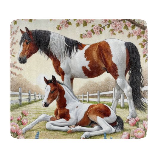 Mooi paard en veulen in een bloeiende boomgaard snijplank (Voorkant)