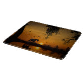 Mooi paard en zonsondergang met waterland snijplank (Hoek)