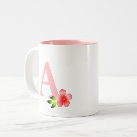 Mooi roze monogram met bloem op wit tweekleurige koffiemok (Voorkant links)