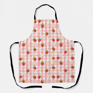 Mooie aardbei en bloemen op roze geruit schort
