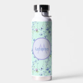 Mooie Aqua Blue groene fles met paarse bloemen (Links)