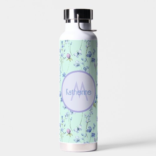 Mooie Aqua Blue groene fles met paarse bloemen (Links)
