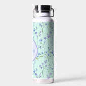 Mooie Aqua Blue groene fles met paarse bloemen (Achterkant)