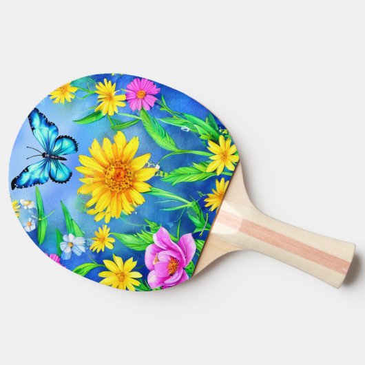 Mooie blauwe vlinder in een bloeiende weide tafeltennisbatje (Zijkant)