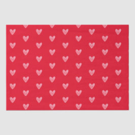 Mooie bleke waterverf hartjespatroon op rood tissuepapier