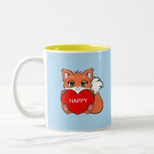 Mooie blije babyvos met hart tweedelig koffiekopje tweekleurige koffiemok