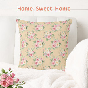Mooie bloemen in pasteltinten op beige kussen