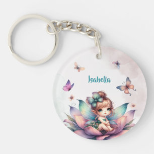 Mooie fee zittend in een bloem sleutelhanger