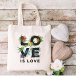 Mooie Floral Love is Love Pride Tote Bag<br><div class="desc">De canvas tas met de LOVE IS LOVE geschreven in vette zwarte letters,  versierd met groen,  bessen en bloemen in rood,  oranje,  geel,  groen,  blauw en paars,  geïnspireerd door de kleuren van de regenboogpride.</div>
