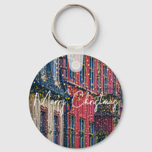 Mooie gebouwen met kerstverlichting sleutelhanger