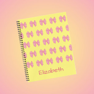 Mooie gele en roze strikken patroon meisjesnaam notitieboek