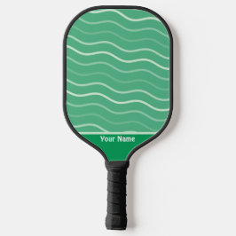 Mooie golvende lijnen strepen groene pickleballpad pickleball paddle