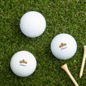 Mooie gouden kroon en aangepaste naam golfballen (Insitu Gras)