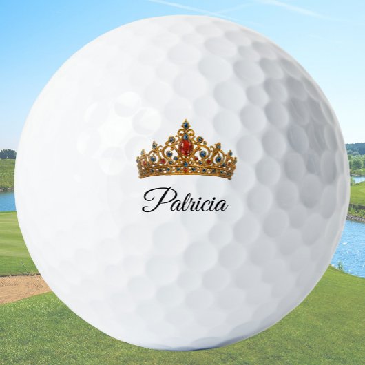 Mooie gouden kroon en aangepaste naam golfballen