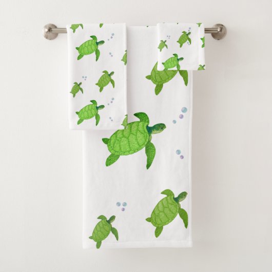 Mooie groene zeeschildpadden op wit bad handdoek (Insitu)