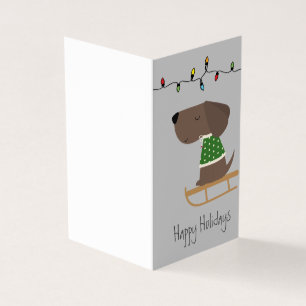 Mooie hond op slee kerstkaart kaart