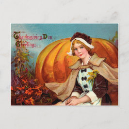 Mooie jonge vrouw met een grote pompoen thanksgivi briefkaart