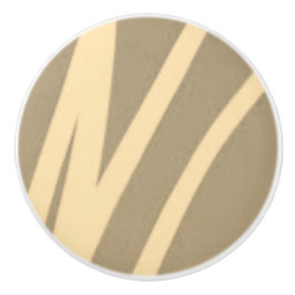 Mooie kabinetstrek met crème en beige keramische knop