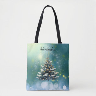 Mooie kerstboom met sneeuw en gouden lampjes tote bag