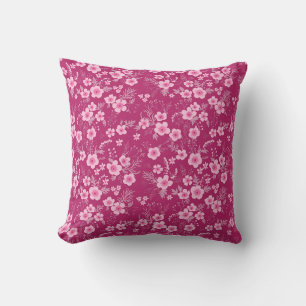 Mooie kleine roze bloemen met magenta achtergrond kussen