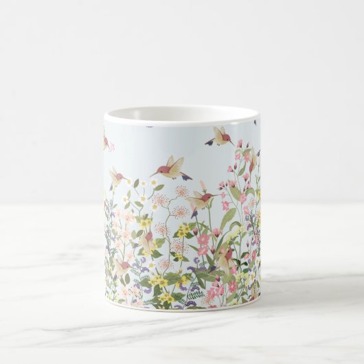 Mooie kolibrie in de bloemenhoed koffiemok (Center)