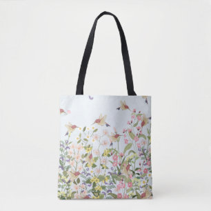Mooie kolibrie in de bloemenhoed tote bag