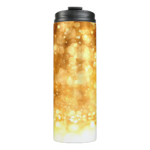 Mooie luxe gouden rode glitterachtergrond. thermosbeker