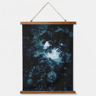 Mooie maan gloed door bomen  hangend wandkleed