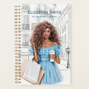 Mooie meisje met koffie en boodschappentassen planner