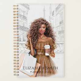 Mooie meisje met koffie en winkelzakken planner