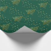 Mooie metallic gouden kerstboom op groen cadeaupapier (Hoek)