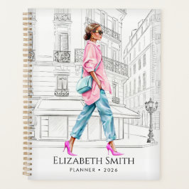 Mooie mode vrouw loopt planner