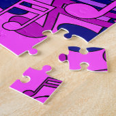 Mooie muzikale muzieknoten met kleurrijke kunst legpuzzel (Zijkant)