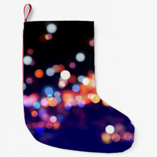 Mooie nacht in de stad, licht, abstracte blur de kleine kerstsok