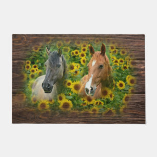 Mooie paarden op het gebied van zonnebloemen deurmat