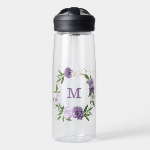 Mooie paarse bloemen groen waterfles
