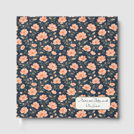 Mooie perzikbloesems op marineblauw gastenboek
