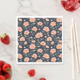 Mooie perzikbloesems op marineblauw servet