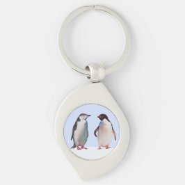 Mooie pinguïn vogelkoppel op lichtblauw sleutelhanger