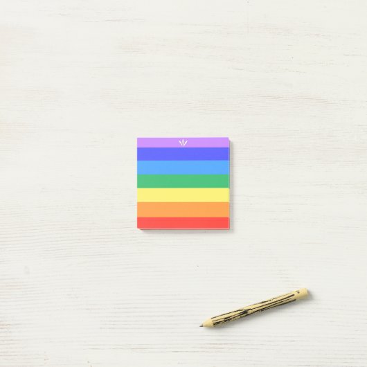 Mooie regenboogkleuren post-it® notes (Op bureau)