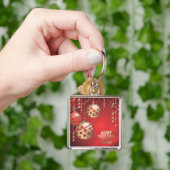 Mooie rode en gouden kerstballen sleutelhanger (Hand)