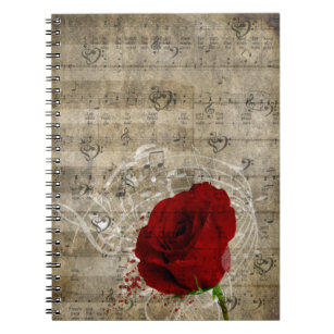 Mooie rode rozenroze muzieknoten zwoegen piano notitieboek