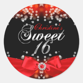 Mooie rode strik en glinsterende Sweet 16 sticker